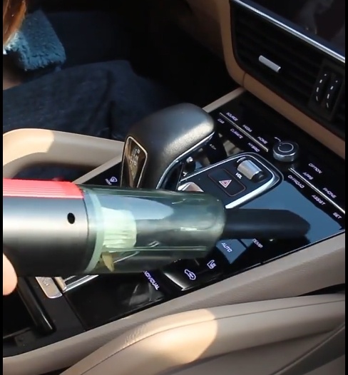 88682def-499e-429d-84fd-1a26aa9a112a.jpg Wired Silver and Red Handheld Car Vacuum Cleaner with Strong Suction