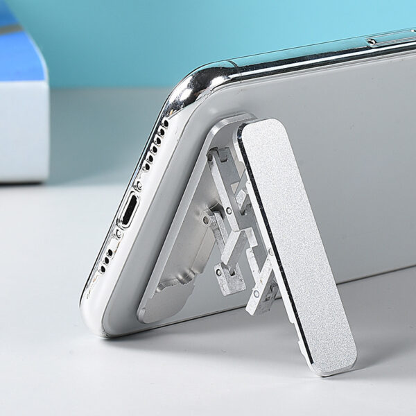 8ad2683b-14be-4681-9864-ee104e1f606f.jpg Mini Folding Backstick Phone Holder – Portable & Invisible Universal Stand